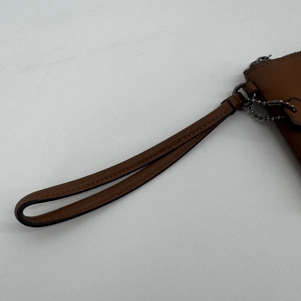 Coach x Pac-Man Limited Edition Leather Wristlet Saddle Brown F54841